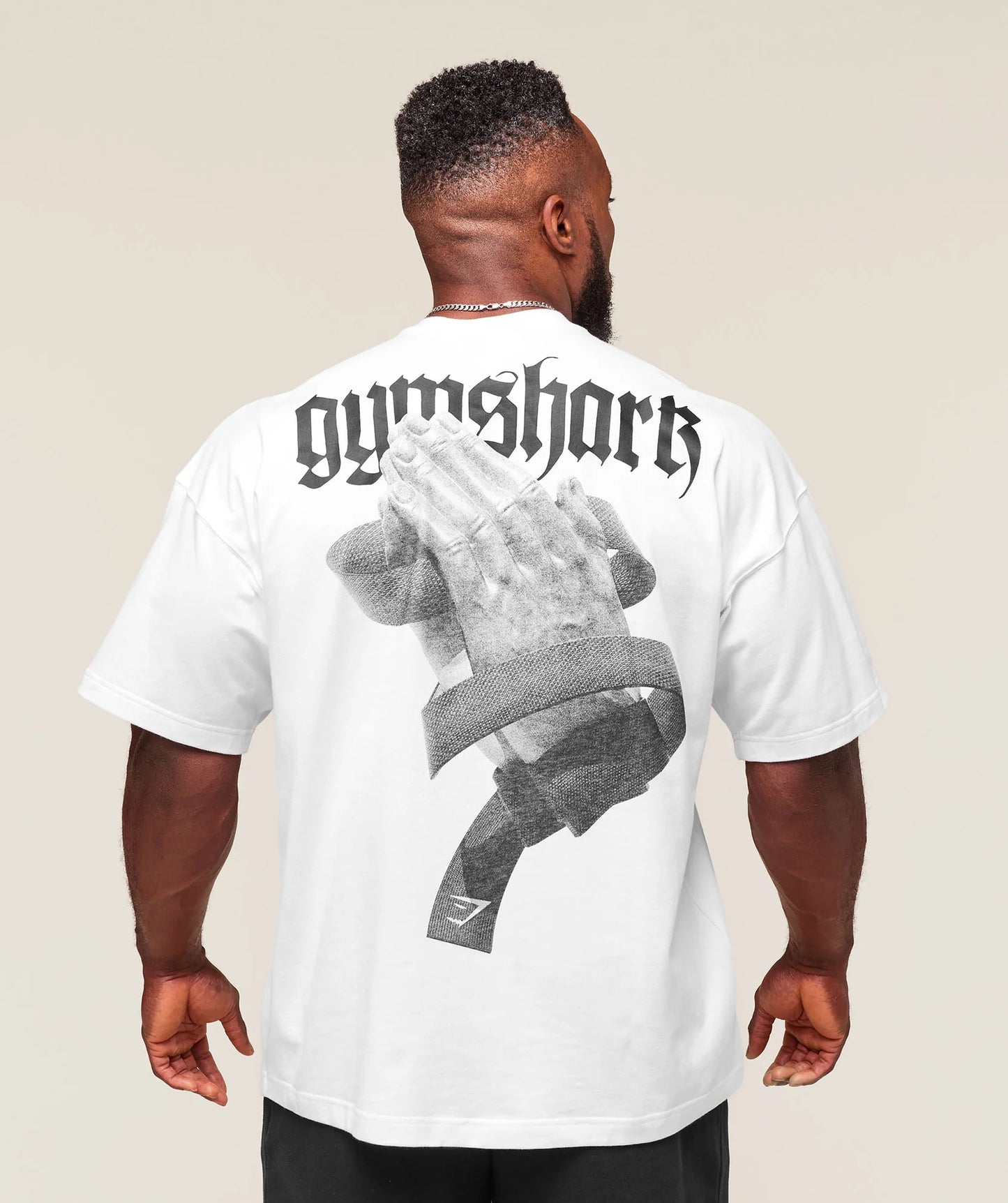 PLAYERA OVERSIZED PRAYER HAND GYMSHARK